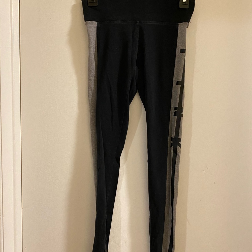 Victoria’s Secret pink leggings with grey down leg